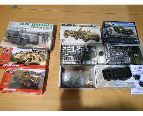 Three military related kits; 1/25 scale Dragon- command vehicle and 1/48 scale Airfix Jackal and Bedford. All appear complete