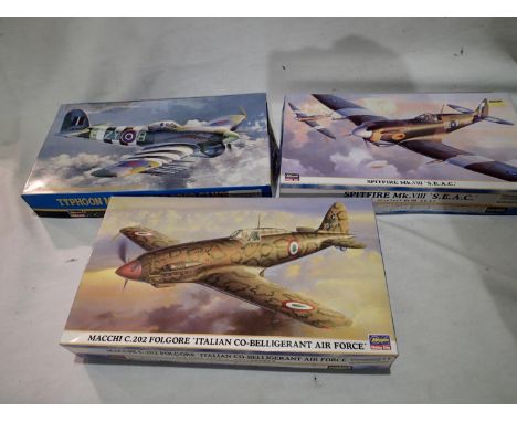 Three Hasegawa kits; Typhoon MK13 with tear drop canopy, Spitfire MK VIII S.E.A.C and Machi C.202 Folgore Italian air force. 