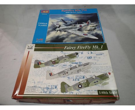 Two aircraft kits; ICM Spitfire MK VII and Eagle Strike Fairey Firefly MK1. UK P&amp;P Group 1 (£16+VAT for the first lot and