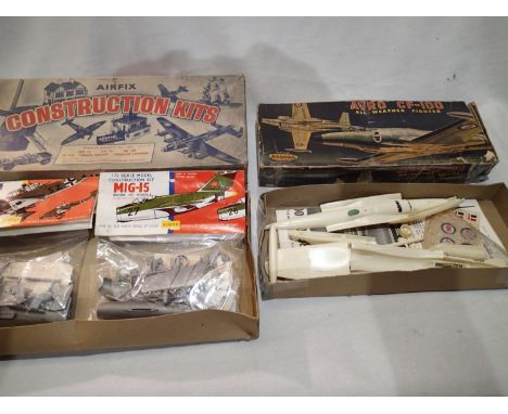 Two early vintage plastic kits; Airfix famous aircraft set 1, containing two bagged kits, MIG15 and Stuka, Aurora Avro CF-100