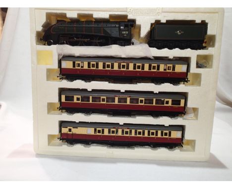 OO scale Hornby R2435 The Northumbrian train pack, A4 class locomotive with three Blood/Custard coaches, loco has been re nam