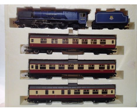 OO scale Hornby R2303m, Royal Scot Train pack, comprising; Princess Alexandra locomotive with three Blood/Custard coaches, on