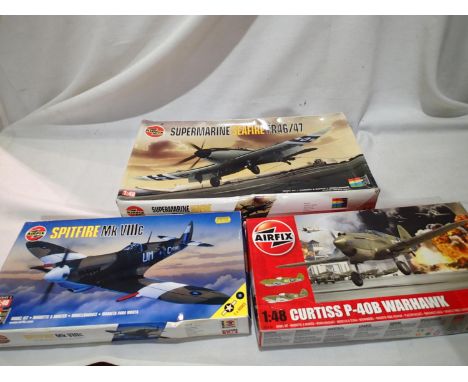 Three Airfix kits; Spitfire MK VIII C, Curtiss P-40 B Warhawk and Seafire FR 46/47. UK P&amp;P Group 1 (£16+VAT for the first