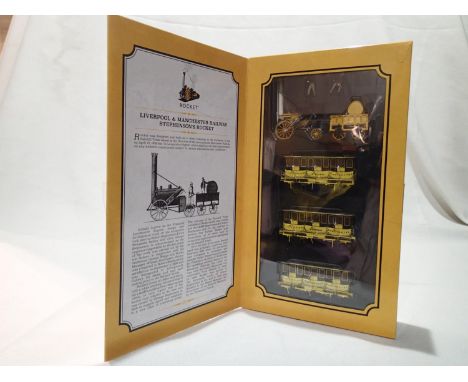 OO scale Hornby R3810 Liverpool and Manchester Rocket train pack, Rocket with three coaches, in near mint condition, storage 
