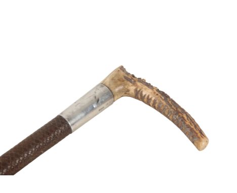 SWAINE ADENEY: A LADY'S RIDING CROPwith antler top, the silver collar inscribed 'T. R. Blain Chester', leather plaited shaft 