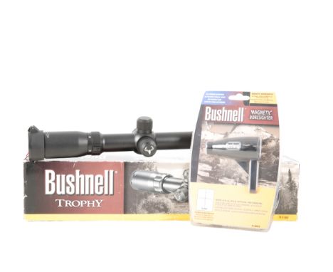 BUSHNELL TROPHY XLT 3 -12 X 56 RIFLE SCOPE in the original box; and a Bushness Magnetic Boresighter, in the original packagin