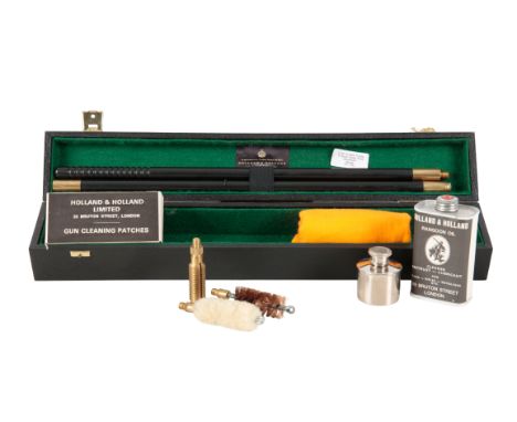 A HOLLAND & HOLLAND LIMITED GUN CLEANING SET for a twelve bore shotgun, including a two-piece brass and nylon cleaning rod, o