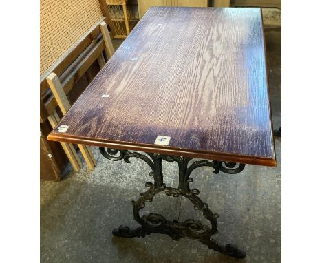 Vintage oak top pub table with ornately scroll decorated cast iron base.   (B.P. 21% + VAT) 