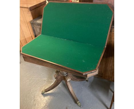 19th century mahogany folding card table with brass inlay on quatrefoil base with brass paws and castors.  (B.P. 21% + VAT) 