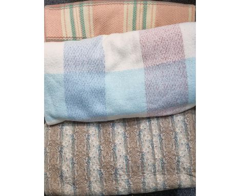 Box containing textiles to include: two check blankets or carthen; one vintage woollen with fringed edge and one fleece blank