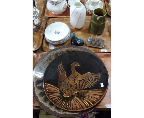 Two trays of Poole pottery to include: small cake plates, eggcup stand, vases, toastrack, seal figure, charger with goose des
