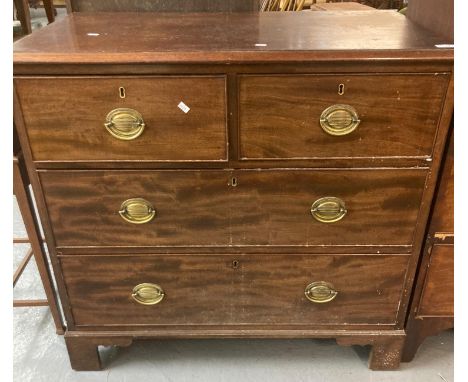 19th century mahogany straight front chest of two short and two long drawers, with brass swan neck handles on a projection ba