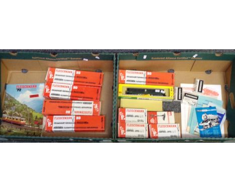 Two boxes of Fleishmann HO scale items, all in original boxes, to include: various carriages, manuals, etc.  (2)  (B.P. 21% +