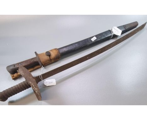 British, probably WWI Enfield bayonet, with leather covered scabbard and webbing frog.  Together with a distressed 19th centu