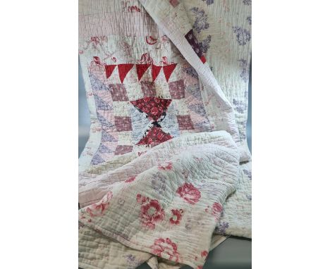 Vintage cotton patchwork quilt with various fabrics, floral print to reverse. (B.P. 21% + VAT)196x212cm approx.