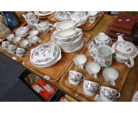 Three trays of 'Indian Tree' dinner ware made by Maddock: two teapots, six cups, four saucers, milk jugs, sugar basin, coffee