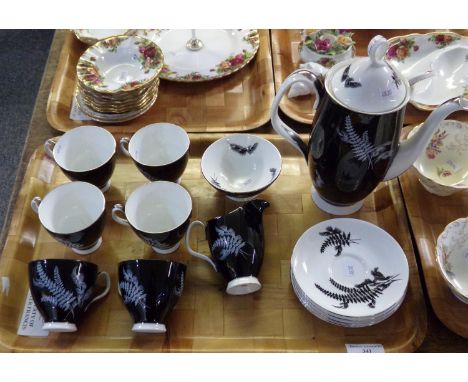 Tray of Royal Albert 'Night and Day' black and white coffee ware, elegantly decorated  with ferns: Coffee pot, six coffee cup