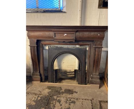 Edwardian mahogany architectural fire surround with associated cast iron grate. (B.P. 21% + VAT)The Fire surround dimensions 