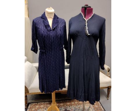 Two dark blue crepe vintage 30's/40's dresses; one with frilled colour and small bells down the neckline, the other in a stri