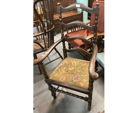 Early 20th century oak high ladder back  open armchair with upholstered seat on turned supports.   (B.P. 21% + VAT) 