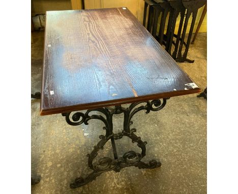 Vintage oak top pub table with ornately scroll decorated cast iron base.   (B.P. 21% + VAT) 