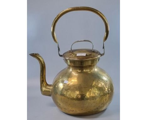 Large vintage beaten brass baluster lidded teapot.  (B.P. 21% + VAT) 