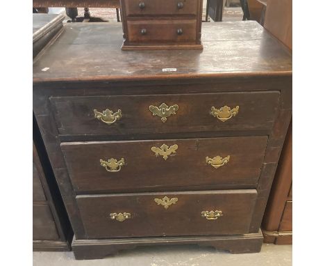 18th century oak straight front chest of three drawers on a projecting base and bracket feet. 81x58x82cm approx. (B.P. 21% + 