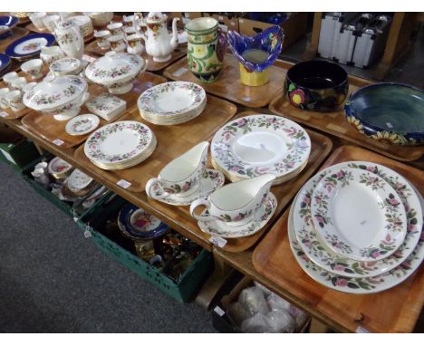 Five trays of Wedgwood 'Hatherway Rose' dinner and coffee ware: six place settings of dinner plates side plates soup plates, 