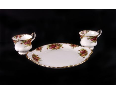 A Royal Albert 'Old Country Roses' six part china tea service, wrapped in two Royal Albert boxes, the teapot in one other (3)