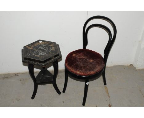 A vintage black painted child's Thonet style café chair, together with a tripod base child's black painted occasional table, 
