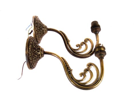 A set of four wall lights,  together with brass fittings, and additional brass lamp branches