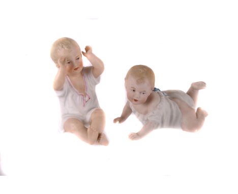 A pair of Heubach's bisque piano babies,  in nightwear, both marked to base, together with Stanton's 'Heubachs Little Charact