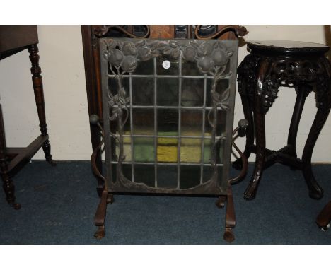 Arts & Crafts leaded glass firescreen of copper and iron construction with applied fruit tree decoration framing a bank of tr
