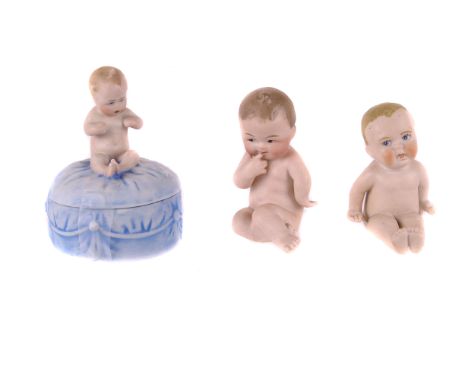 Two 19th century German bisque piano babies,  together  piano baby trinket box (3)