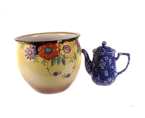 A quantity of ceramics,  including serving and dinner plates, a planter and a teapot