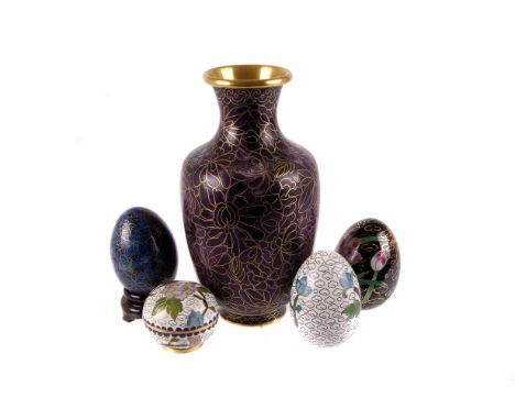 A group of Chinese cloisonné enamel ware,  including five eggs with stands, a vase, and two trinket boxes