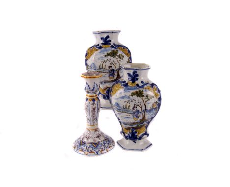A mid 18th century De Blompot Dutch Delft garniture ,  the two covered vases with  parakeet finials, 30cm high, together with