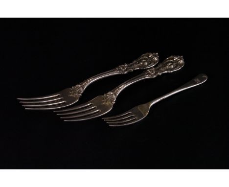 A pair of American silver table forks by Reed and Barton,  Francis I pattern, circa 1950, together with a silver dessert fork