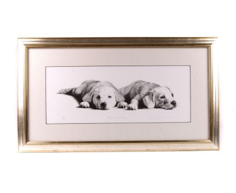 A limited edition print of two puppies,  titled 'Recharging', 222/850, 54cm x 20cm framed, together with another landscape pr