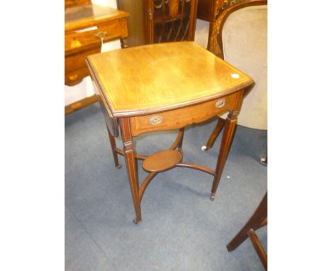 A Edwardian Mahogany drop leaf occasional table,  the satin wood cross banded top surmounts a single frieze drawer supported 