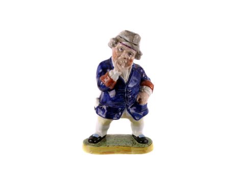 A 19th century Staffordshire tobacco jar,  modelled as snuff taking gentleman, 32cm high