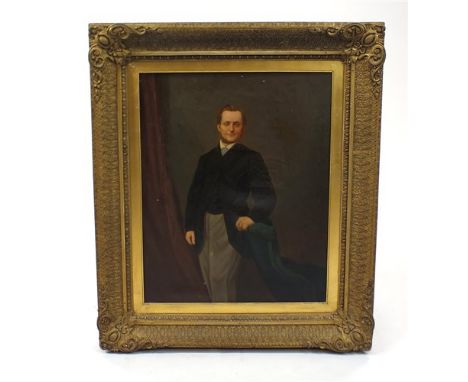 A full length portrait of a gentleman, Mr George Dell (1829-1870), the subject standing beside an upholstered chair, oil on c