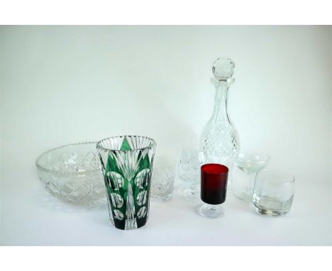 A large collection of cut and pressed table and drinking glassware, including boxed Edinburgh Crystal, a ship's decanter and 