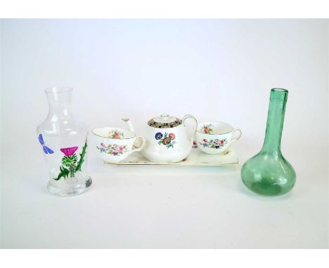 A collection of assorted ceramics and glassware to include, a Dutch Gouda jug busily decorated with floral motifs against a g