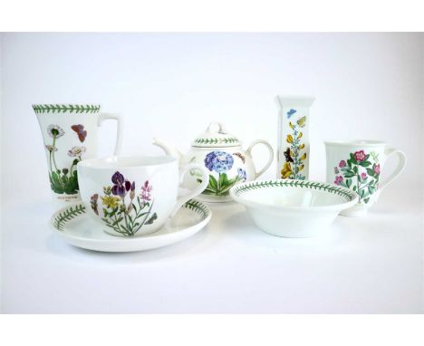 A collection of Portmeirion Botanic Garden tableware, including a teapot and cover, large breakfast cups and saucers, tall mu