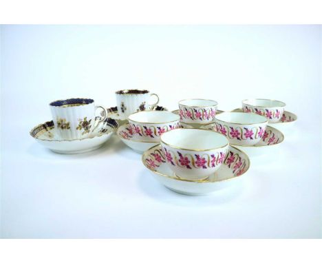 Five late 18 th /early 19 th century English porcelain tea bowls and saucers, painted with a repeating central band of flower