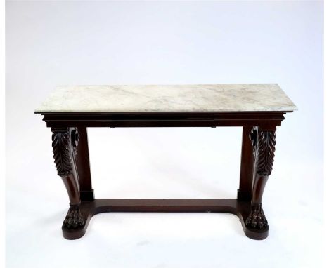 A 19th century marble topped mahogany console table, the white marble top with a bevelled border above a shaped frieze accomm