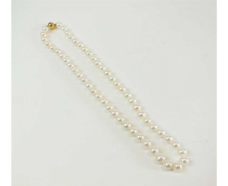 A uniform cultured pearl necklace, comprising; fifty-three cultured pearls, with yellow metal clasp stamped '375', length app