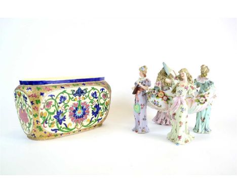 A Plaue porcelain basket, late 19th century, the florally decorated basket supported by four female musicians, underglaze blu