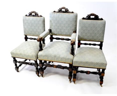 A set of six (4+2) Victorian oak panel back dining chairs, each with acanthus scroll top rail and later green foliate lozenge